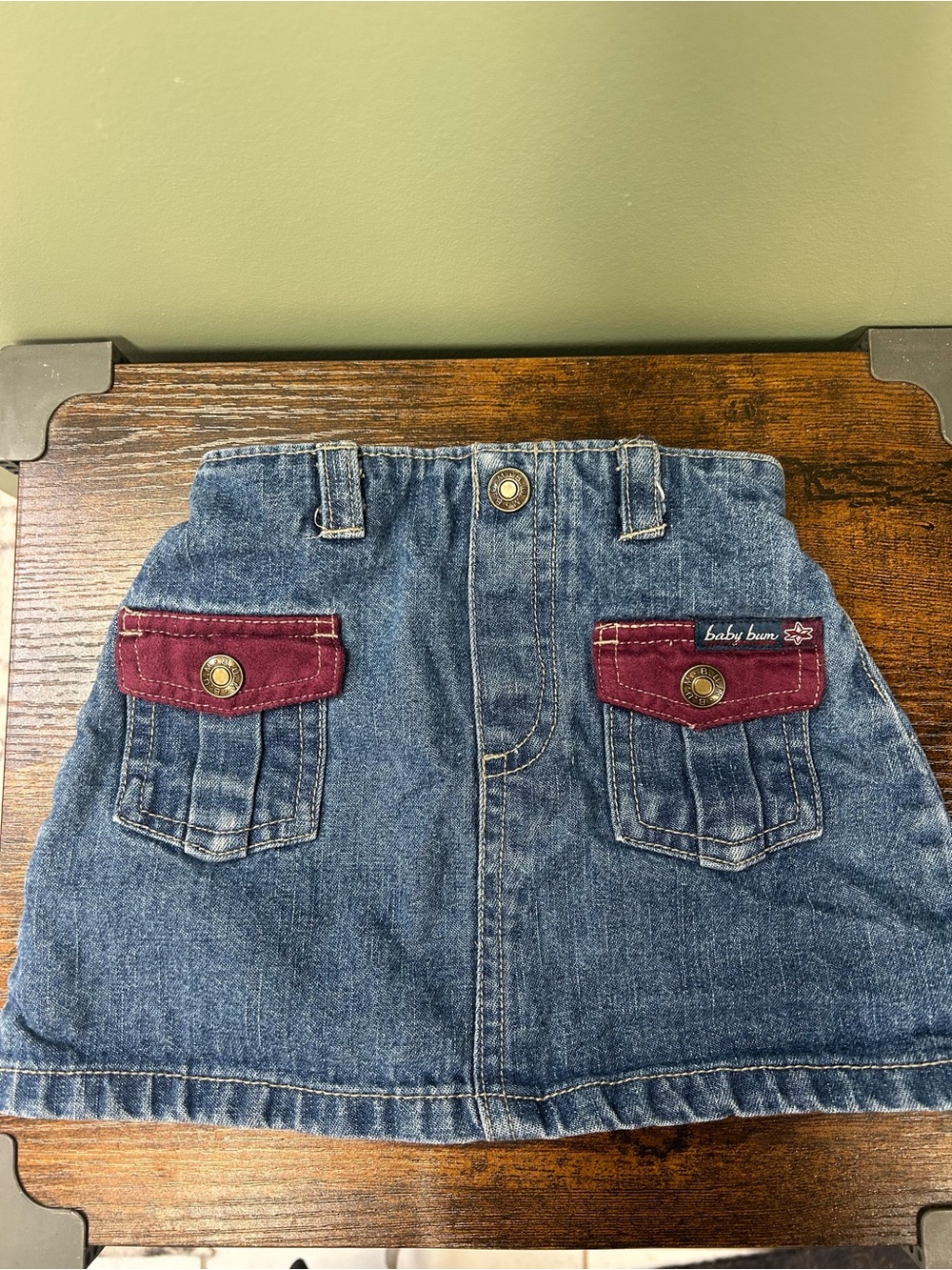 Baby Bum Denim Skirt with Burgundy Pocket Accents